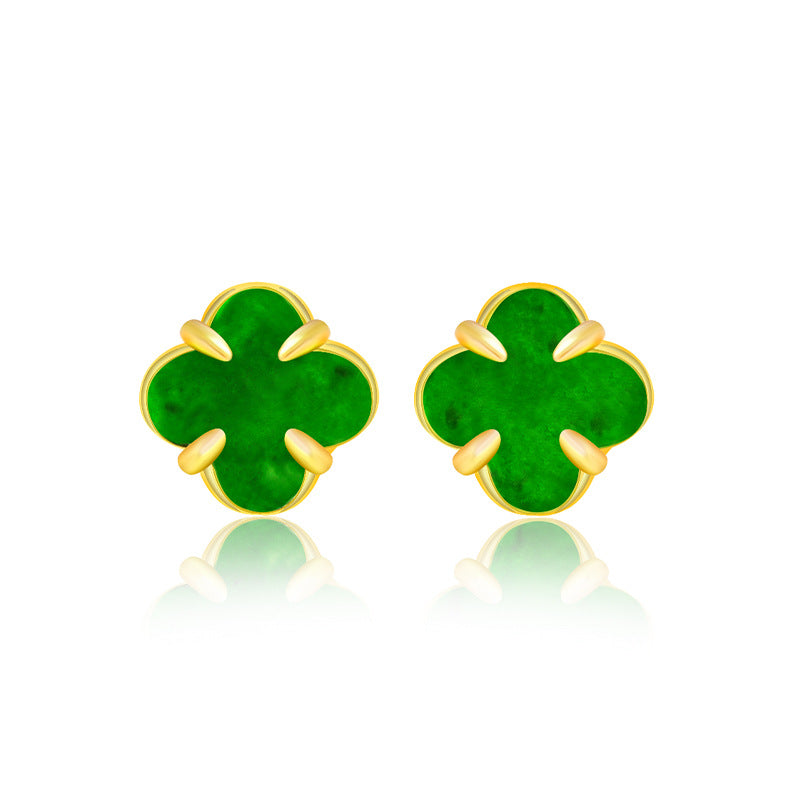 Studio product display of the BoxUnboxed premium natural jadeite clover studs reflecting cleanly onto a pristine white surface.