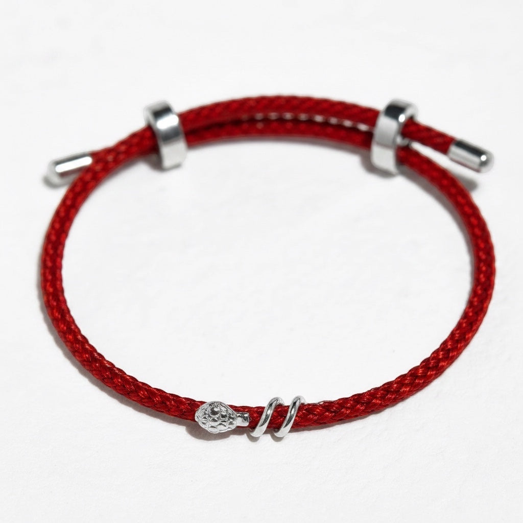 BoxUnboxed 18k solid gold snake bracelet with diamond on red string. Adjustable fit.