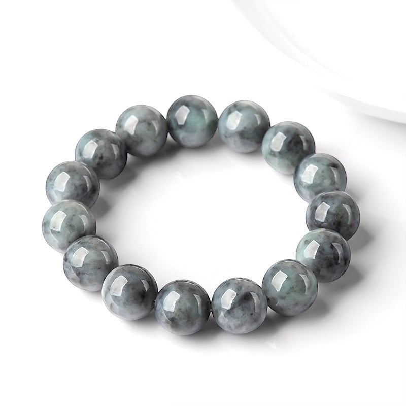 BoxUnboxed Maison Natural Black Jadeite Beaded Bracelet with 13mm spheres, smoky charcoal-to-black depth, and glass-like luster.