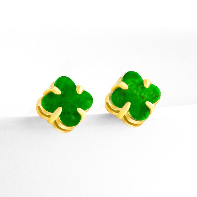 BoxUnboxed clover stud earrings featuring hand-carved green Myanmar jadeite set in polished gold vermeil claws.