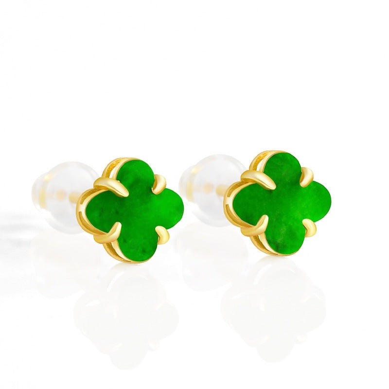 BoxUnboxed clover stud earrings featuring hand-carved green Myanmar jadeite set in polished gold vermeil over silver.