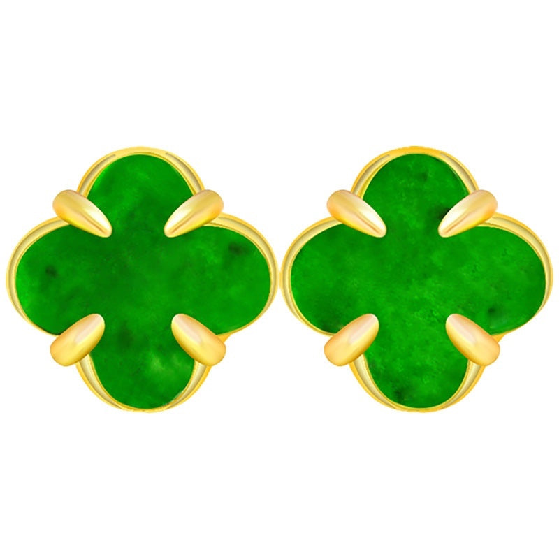 BoxUnboxed clover stud earrings featuring hand-carved green Myanmar jadeite set in polished gold vermeil claws.