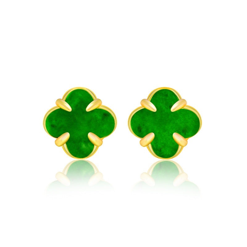 BoxUnboxed clover stud earrings featuring hand-carved green Myanmar jadeite set in polished gold vermeil claws.