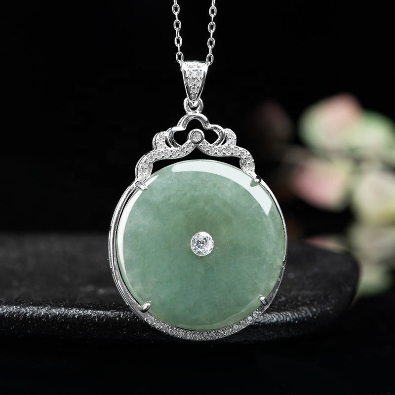 BoxUnboxed Grade A Myanmar jadeite peace buckle pendant in S925 sterling silver with pave halo and crown bail.