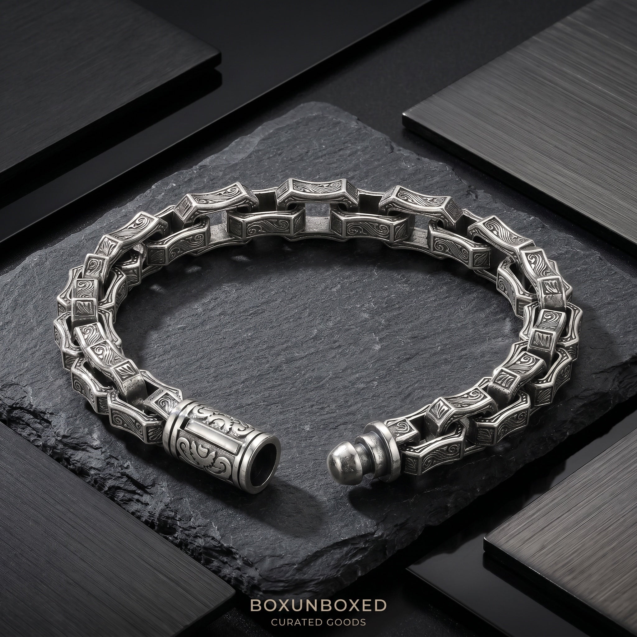 BoxUnboxed Rock Sovereign geometric link bracelet in solid 925 sterling silver with a 10mm profile and chiseled rock facets.